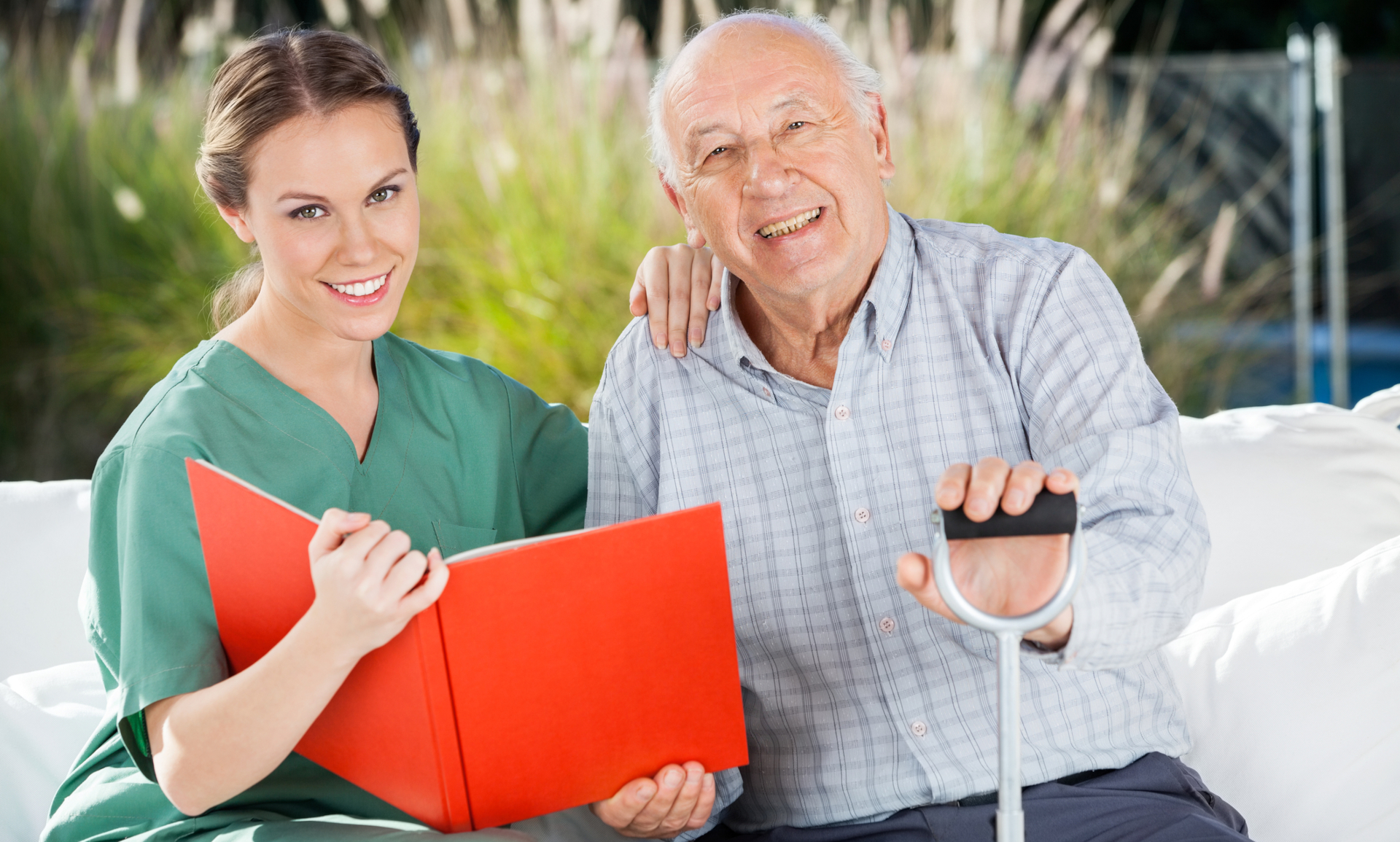 Care worker sitting with client