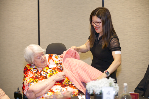 Caring Support @ Home Director assisting client